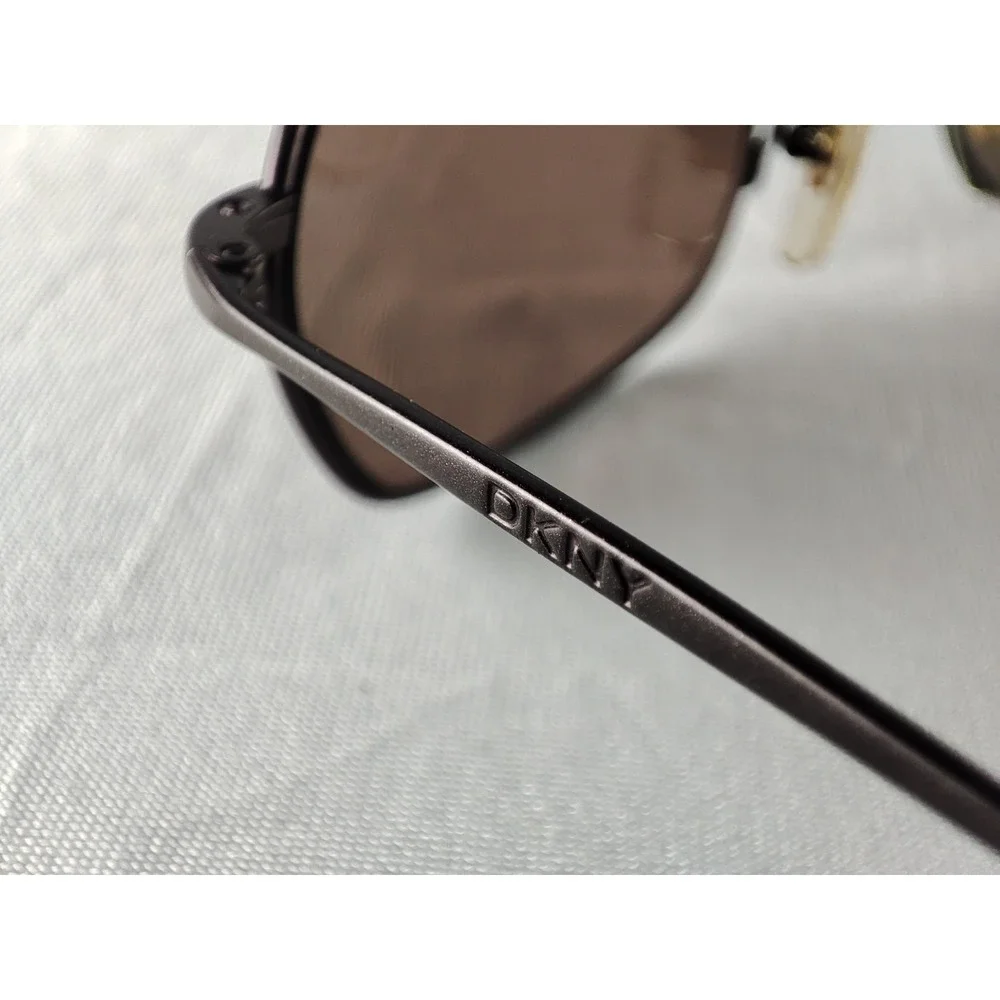DKNY 7241S 201 Women's Sunglasses Black Metal Oval Brown Lens 53-20-140